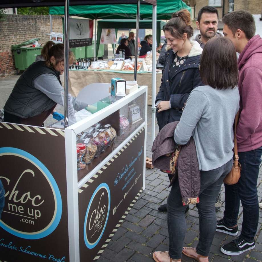 People queuing for pancakes from Choc Me Up Stand