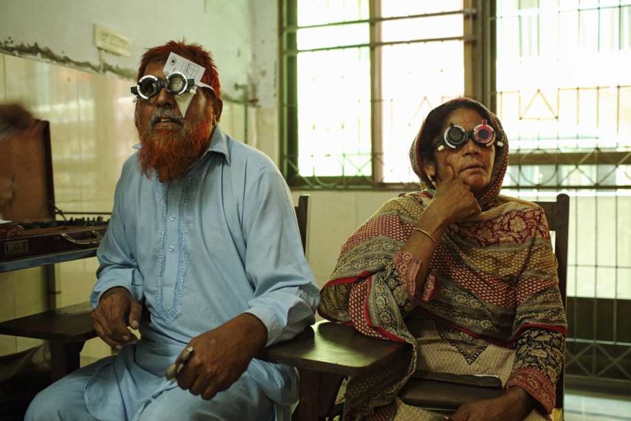 Man and Women wearing optical Equipment